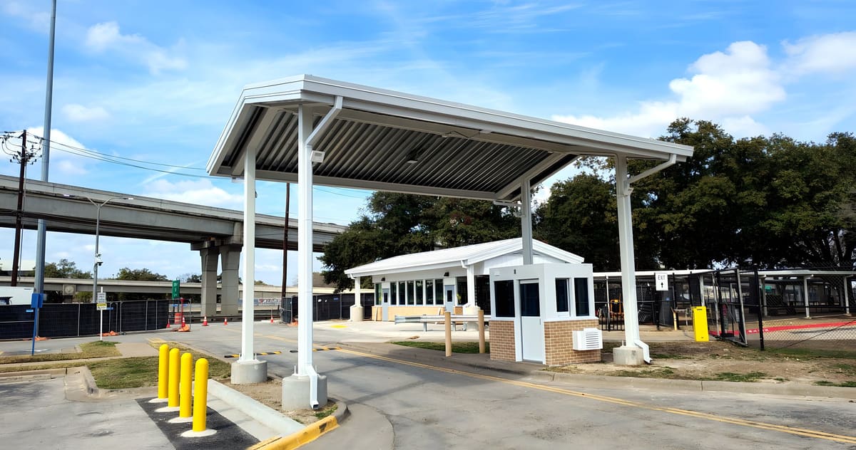 IRS Visitor Center — A visitor screening canopy for a federal campus — public government steel, built and in service.